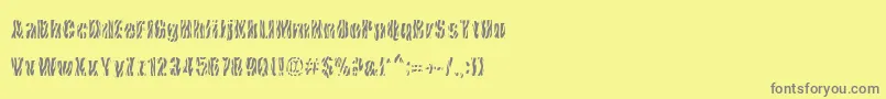 フォントCowsInTheU.S. – 黄色の背景に灰色の文字
