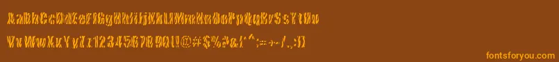 CowsInTheU.S.-Schriftart – Orangefarbene Schriften auf braunem Hintergrund