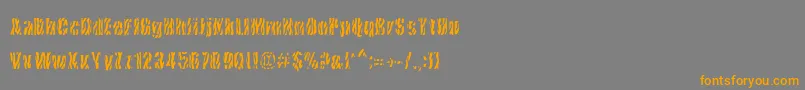 フォントCowsInTheU.S. – オレンジの文字は灰色の背景にあります。