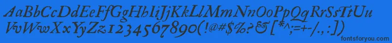 RegulaItalic Font – Black Fonts on Blue Background