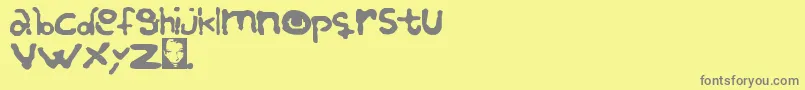 ReBuried Font – Gray Fonts on Yellow Background