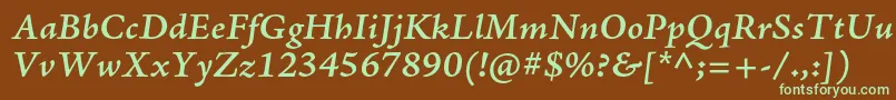 フォントAjensonproSemibolditcapt – 緑色の文字が茶色の背景にあります。