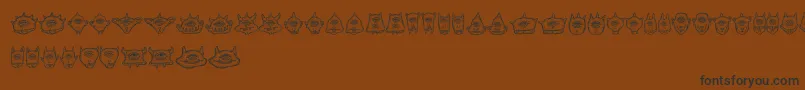 Cyclopia Font – Black Fonts on Brown Background