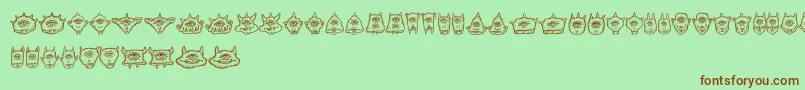 fuente Cyclopia – Fuentes Marrones Sobre Fondo Verde