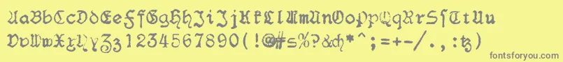 More about F25Blacklettertypewriter Font F25Blacklettertypewriter Font – Gray Fonts on Yellow Background