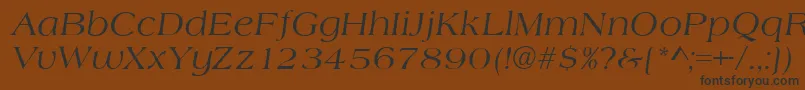 Czcionka AlmeriaItalic – czarne czcionki na brązowym tle