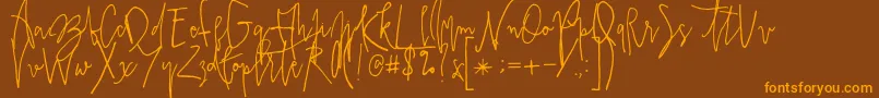 Lisätietoja Prestigescriptalt-fontista Prestigescriptalt-fontti – oranssit fontit ruskealla taustalla