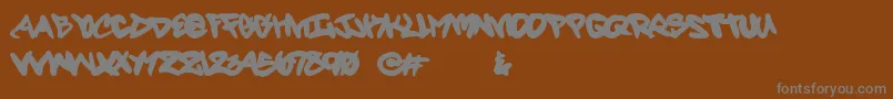 Fortyscript-Schriftart – Graue Schriften auf braunem Hintergrund
