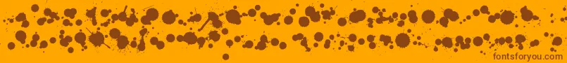 WcRhesusBBta Font – Brown Fonts on Orange Background