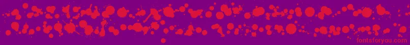 WcRhesusBBta-Schriftart – Rote Schriften auf violettem Hintergrund