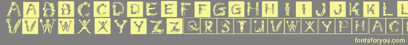 Childrensalphabet Font – Yellow Fonts on Gray Background