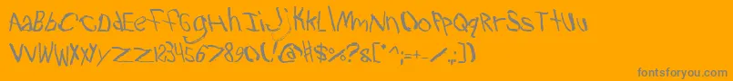 Travb2-Schriftart – Graue Schriften auf orangefarbenem Hintergrund