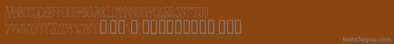 FromTheWoods Font – Gray Fonts on Brown Background