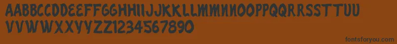 RenoCasino Font – Black Fonts on Brown Background