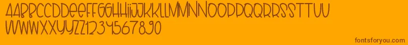 Puppy Font – Brown Fonts on Orange Background