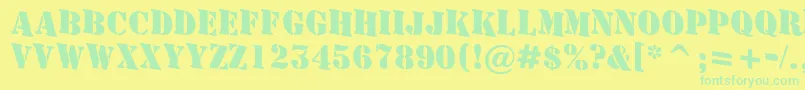 AStamperdnBold Font – Green Fonts on Yellow Background