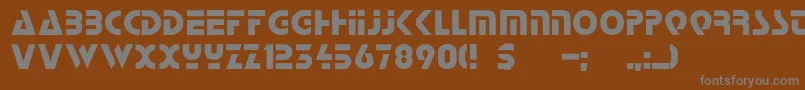 Stopc-fontti – harmaat kirjasimet ruskealla taustalla