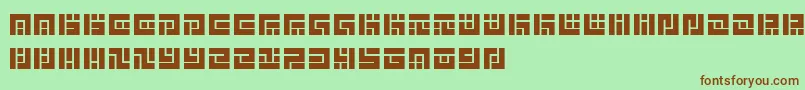 SymvolaTrio Font – Brown Fonts on Green Background