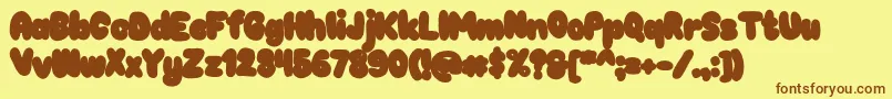 Chokooutline Font – Brown Fonts on Yellow Background