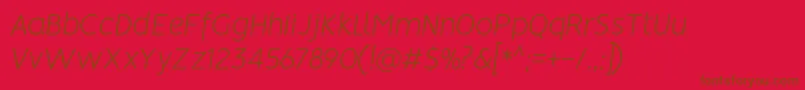 VisionLightitalic-Schriftart – Braune Schriften auf rotem Hintergrund