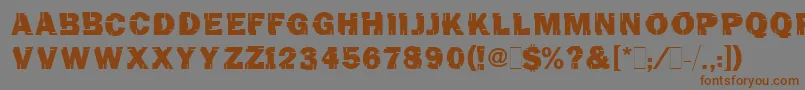 TinchoMugnolo-Schriftart – Braune Schriften auf grauem Hintergrund