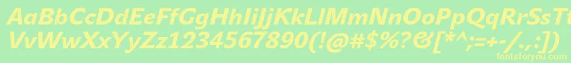 JohnsansHeavyProItalic-fontti – keltaiset fontit vihreällä taustalla