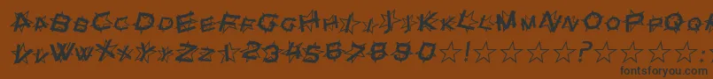 SfStarDustItalic-Schriftart – Schwarze Schriften auf braunem Hintergrund