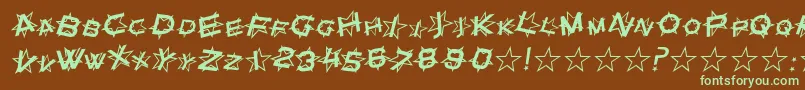 フォントSfStarDustItalic – 緑色の文字が茶色の背景にあります。