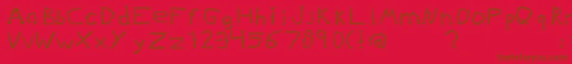 Kiddiegrinder Font – Brown Fonts on Red Background