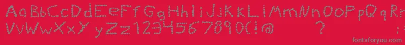 Kiddiegrinder Font – Gray Fonts on Red Background