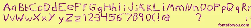 Kiddiegrinder Font – Purple Fonts on Yellow Background
