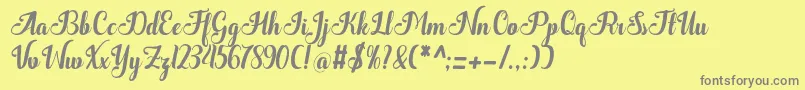 フォントQuantum – 黄色の背景に灰色の文字