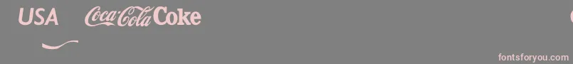 フォントCocacola – 灰色の背景にピンクのフォント