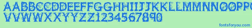 Jfwildwood-Schriftart – Blaue Schriften auf grünem Hintergrund