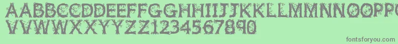 Jfwildwood Font – Gray Fonts on Green Background