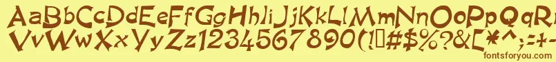 フォントKingasn – 茶色の文字が黄色の背景にあります。