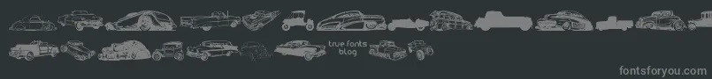 Fonte VintageAutoCarsTfb – fontes cinzas em um fundo preto