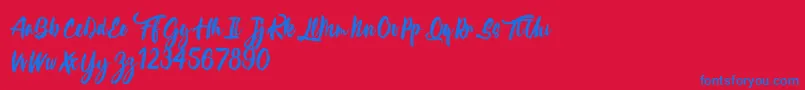 CalypsokaOne-Schriftart – Blaue Schriften auf rotem Hintergrund