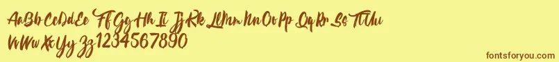 fuente CalypsokaOne – Fuentes Marrones Sobre Fondo Amarillo