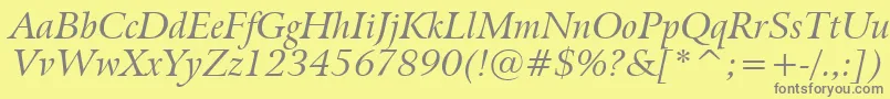 フォントBitstreamArrusItalicBt – 黄色の背景に灰色の文字