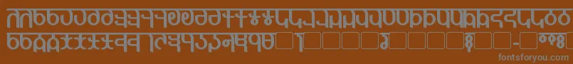 Шрифт QijomiBold – серые шрифты на коричневом фоне