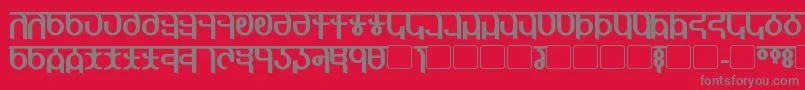 フォントQijomiBold – 赤い背景に灰色の文字