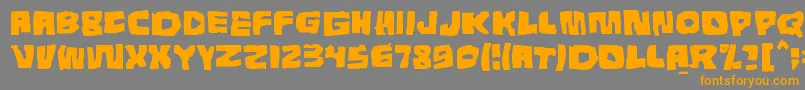 フォントTunnepinta – オレンジの文字は灰色の背景にあります。
