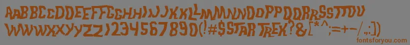 TrekDisruptorBlast Font – Brown Fonts on Gray Background