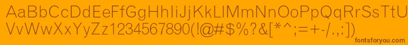 GrotesquemtstdLight-Schriftart – Braune Schriften auf orangefarbenem Hintergrund