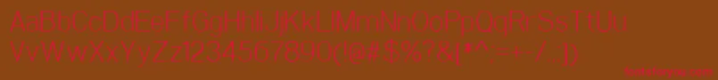 WoolworthLight Font – Red Fonts on Brown Background