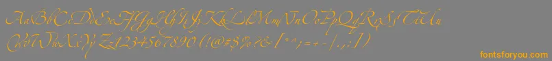 フォントZapfinoextraltTwo – オレンジの文字は灰色の背景にあります。