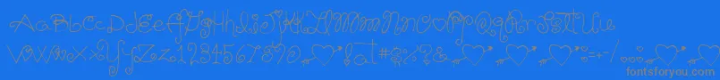 Schnookums-Schriftart – Graue Schriften auf blauem Hintergrund