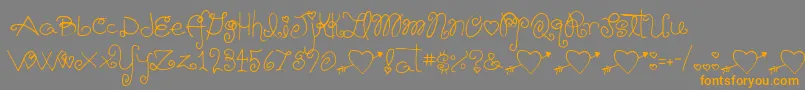 Шрифт Schnookums – оранжевые шрифты на сером фоне