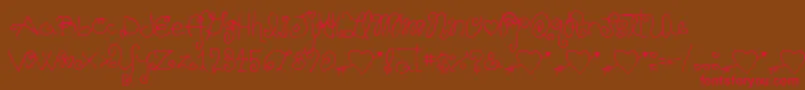 Schnookums Font – Red Fonts on Brown Background